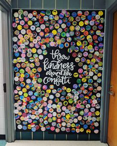 there is a sign on the door that says how kindness knows to be confetti