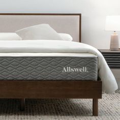 an allswell mattress on a bed frame in a bedroom