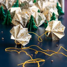 several origami ornaments are sitting on a table