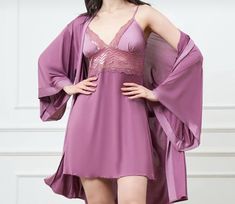 This strappy mini nightgown and robe set is the perfect blend of warmth and elegance, with delicate lace details that elevate its style. The lace accents on the front and back add a feminine and graceful touch. Made from a soft cotton-polyester blend, it offers both comfort and breathability. Whether you're lounging at home or getting ready for bed, this set is designed to make you feel special every moment. The mini cut adds a chic and stylish flair, while the soft fabric ensures a comfortable Nightgown And Robe, Women's Nightgowns, Pajama Robe, Nightgowns, How To Feel Beautiful, Getting Ready, Lace Detail, Night Gown, Halloween Shopping