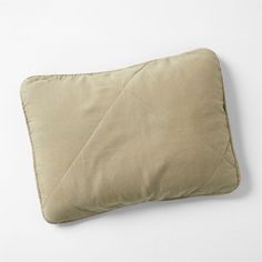 the pillow is made from linen and has a zippered closure on it's side