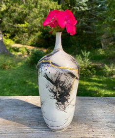 This uniquely shaped vase is 4.25"w x 9.5"h. It combines the ancient Japanese Raku firing technique with the Native-American art of adding delicate horsehair and feathers onto the vase's 1400 degree surface. The Japanese art of Kintsugi was used to repair tiny thermal shock cracks that occasionally occur when a piece is removed from the kiln. This is a decorative piece only and is not water tight. It's perfect as a stand-alone statement piece or with dried flowers added. Each piece has gone thro Raku Vase, Raku Firing, Hand Wax, Native American Art, Horse Hair, Hand Thrown, Neutral Tones, Creative Process, American Art