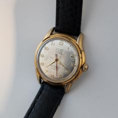 From the early 1950's a rather unusual brand, a FLUDO WESTBURY AUTOMATIC watch in good vintage condition. The gold-plated case is in good condition there are some minor marks and a little wear, it measures 33mm in width excluding the crown. The original dial is in good condition, again with a little marking which in no way detracts from the look of this watch. The crystal is new having been replaced during our service. Case back is stainless steel. The SWISS made movement is rather special, it i Swiss Made, Wristwatch Men, Wrist Watches, Automatic Watch, Vintage Watches, No Way, Jewellery And Watches, Wrist Watch, Leather Straps