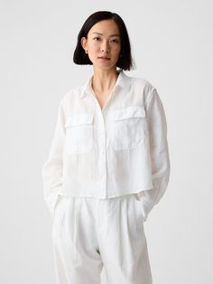 Soft, breathable linen cropped shirt.  Point collar.  Long sleeves with button cuffs.  Button front.  * Fit: Slightly fitted.  Sits close to the body.  Cropped, hits at the waist.  Note: Tyla is wearing a Gap Pants For Short Women, Long Sleeve Layering, Linen Crop Top, Linen Crops, Layered Shirts, Linen Bottoms, Cropped Shirt, Elbow Sleeve, Shirt And Pants