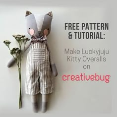 a stuffed animal is holding flowers on the wall with text overlaying it that reads, free pattern & tutor make lucky kitty overalls on creative bug