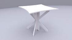 a white table sitting on top of a gray floor