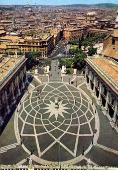 an aerial view of a city with lots of buildings