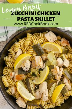 lemon basil zucchini chicken pasta skillet in a pan with sliced lemons