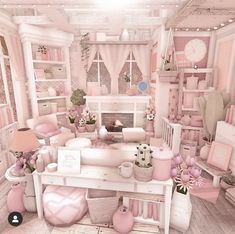 a room filled with lots of pink furniture and decor on top of wooden flooring