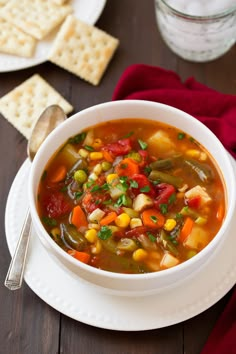 a white bowl filled with soup on top of a table