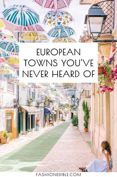 a woman sitting on the sidewalk under umbrellas with text overlay that reads european towns you've never heard of