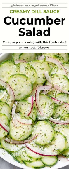 cucumber salad in a white bowl with red onions