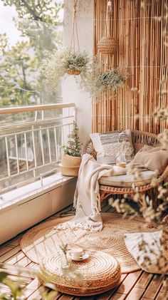 a balcony with wicker furniture and potted plants on the floor, next to an open window