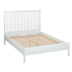 a white bed frame with wooden slats