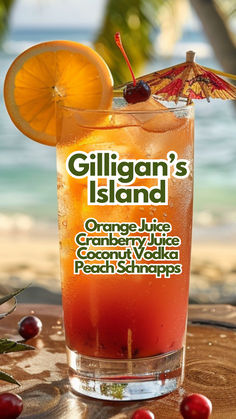 an orange juice cocktail with garnish on the beach