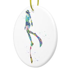 a round ornament with a woman's body painted in watercolors