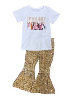 Make her sparkle with our Enchanted Concert Gold Sequin Bell Bottom Girls Outfit. Featuring a dazzling top paired with luxurious gold sequin bell bottom pants, this outfit is perfect for young stars. Ideal for concerts, parties, or special events, it combines comfort with eye-catching style. Let her shine bright and enchant the crowd. Shop now for this show-stopping ensemble! Shop now for this show-stopping outfit! And be sure to check out our other must have new arrivals. INCLUDES: Top & Bell B Gold Sets For Party Season, Gold Party Sets For Fall, Ohio Girls, Bell Bottom Pants, Gold Sequin, Bell Bottom, Shine Bright, Bell Bottoms, Enchanted