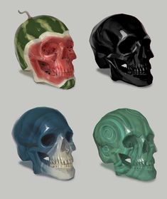 four different colored skulls are shown in this image