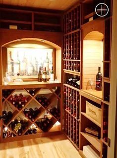 a wine cellar filled with lots of bottles