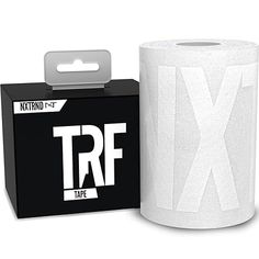 a white roll of toilet paper next to a box with the letter x on it