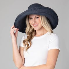 Look stylish and stay protected from the sun with Newport's 6-way Round Crown Sun Hat. This fashionable hat is composed of 75% paper and 25% polyester, protecting you with a UPF 50+ rating. The adjustable brim is 6.25" wide and the hat is 57cm in size. Choose from three colors: brown, natural, and blue. Worthy of any outdoor adventure, this hat can be styled 6-ways for any occasion. Features: Colors: Brown, Natural, & Blue Material: 75% Paper, 25% Polyester Brim Size: 6.25" Size: 57cmSun Protect Wide Brim Hat Summer, Sand Collection, Outdoor Cap, Hat Clips, Summer Favorites, Scarf Poncho, Colors Brown, Beach Hat, Dress Hats