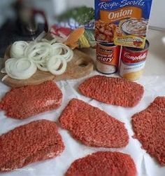 raw ground meat is laid out on a table