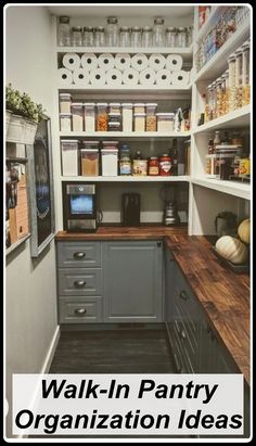 an organized pantry with wooden counter tops and shelves