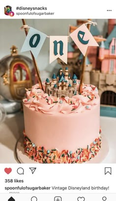 a birthday cake with pink frosting and sprinkles is displayed on instagram