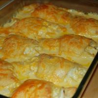 a casserole dish filled with cheesy potatoes