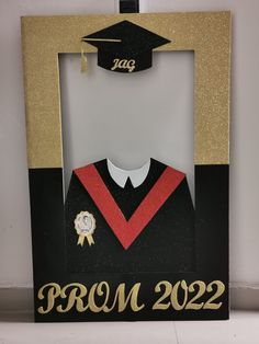 a graduation photo frame with a graduate's cap and gown in the center that says prom 2012