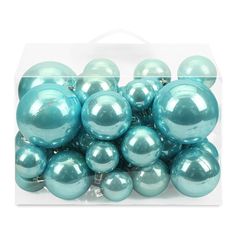 a clear box filled with blue christmas balls