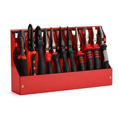 a red tool box filled with lots of different types of tools and knives on top of each other