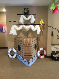 an inflatable pirate ship sits on the floor