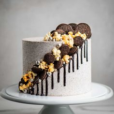 a cake with oreo cookies and popcorn on top