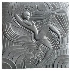 an art deco tile with a woman on it