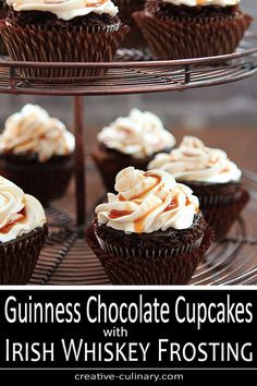 guinness chocolate cupcakes with irish whiskey frosting on a wire rack for display