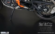 an orange and black motorcycle is shown in this advertisement