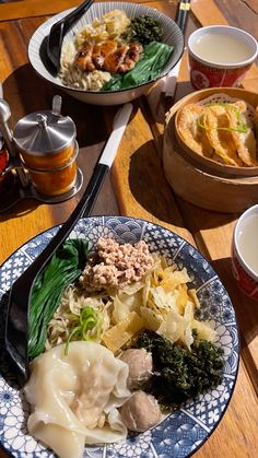 a table topped with plates and bowls filled with food