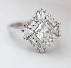 an engagement ring with diamonds on it