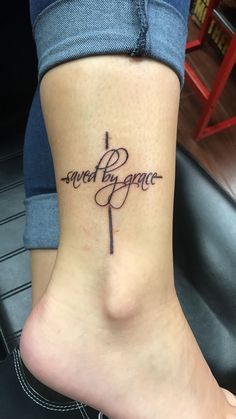 a woman's foot with a tattoo that reads, sweet elegance on the side