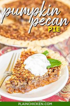 a slice of pumpkin pecan pie on a white plate with whipped cream and green leaves