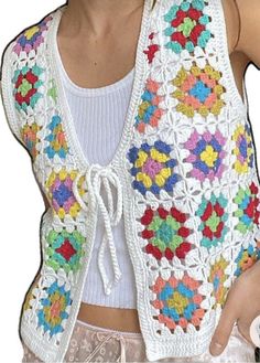 Multicolor Cotton Crochet Top For Fall, Colorful Crochet Top For Spring, Bohemian Fitted Vest For Beach, Multicolor Crochet Top For Winter, Bohemian Multicolor Crochet Top For Spring, Bohemian Patchwork Crochet Top For Summer, Bohemian Cotton Vest For Vacation, Multicolor Bohemian Crochet Top For Spring, Bohemian Vest For Beach And Spring