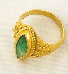 "Antique Chinese Qing Dynasty 22k Gold Navette JADEITE Ring size 6 Hand Crafted 5 grams The Navette Shaped Jadeite Measures: approximately 5 X 14mm The Jadeite is Hand Set in a sculptural Setting Hallmarked on the inside with a Chinese stamp The Qing dynasty , officially the Great Qing, also called the Empire of the Great Qing or the Manchu dynasty, was the last imperial dynasty of China, ruling from 1644 to 1912 with a brief, abortive restoration in 1917. It was preceded by the Ming dynasty and Antique Gold Emerald Cabochon Ring, Gold Emerald Cabochon Ring Gift, Gold Engraved Open Ring With Gemstone, Handmade Gold Emerald Ring For Formal Occasions, 22k Gold Rings With Gemstone, Traditional Gold Emerald Anniversary Ring, Heirloom Gold Emerald Cabochon Ring, Gold Emerald Ring With Stone Setting, 22k Gold Ring With Stone Setting