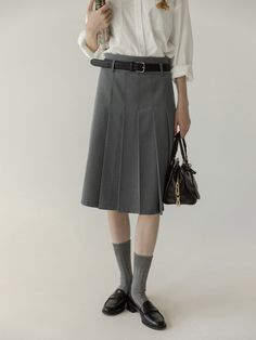 A half skirt with different pleats on the front and back. Pair it with a slender belt to create a classic and fashionable outfit. This item has a sophisticated look and a casual feel. 
 
 
 Size 
 
 
 XS size 
 
 Total length: 61cm 
 Waist: 62cm 
 Hip: 85cm 
 
 S size 
 
 Total length: 62cm 
 Waist: 66cm 
 Hip: 89cm 
 
 M size 
 
 Total length: 63cm 
 Waist: 70cm 
 Hip: 93cm 
 
 L size 
 
 Total length: 64cm 
 Waist: 74cm 
 Hip: 97cm 
 
 
 
 
 
 
 Material 
 
 Polyester 
 Rayon 
 
 
 Model worn Elegant Mini Pleated Skirt With Belt Loops, Fall Workwear Belted Pleated Skirt, Classic Belted Office Skirt, Classic Belted Skirt For Workwear, Elegant Business Casual Skirt With Belt Loops, Fitted Belted Pleated Skirt For Work, Office Knee-length Skirt With Belt Loops, Classic Formal Belted Skirt, Elegant Belted Mini Pleated Skirt