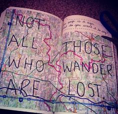 an open book with writing on it that says not all those who wander are lost