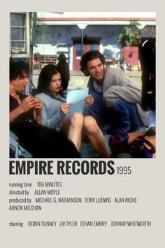 the poster for empire records shows two people sitting on a couch