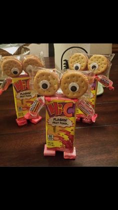 three bags of crackers with eyes and googly eyes on them