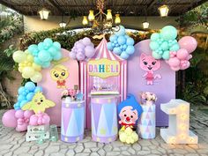 a birthday party with balloons and decorations