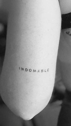 a person with a tattoo on their arm that says, i'd donable