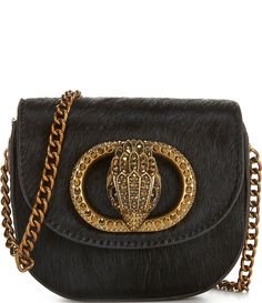 From Kurt Geiger London&#x2C; the Micro Chelsea Saddle Crossbody Bag features:100% leather exteriorPolyester liningFlap/snap closureInside branded slash PU pocketGold hardwareSingle chain strapApprox. 4.13'' W x 3.93'' H x 1.18'' D; Strap drop 23.62"Imported. Saddle Crossbody Bag, Kurt Geiger, Black Cross Body Bag, Dillard's, Chain Strap, Cross Body Handbags, Accessories Design, Saddle, Fashion Statement